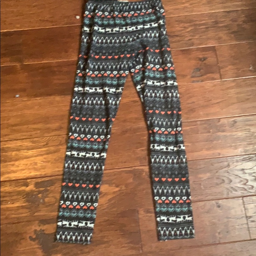 It’s a pair of long black orange and white pants